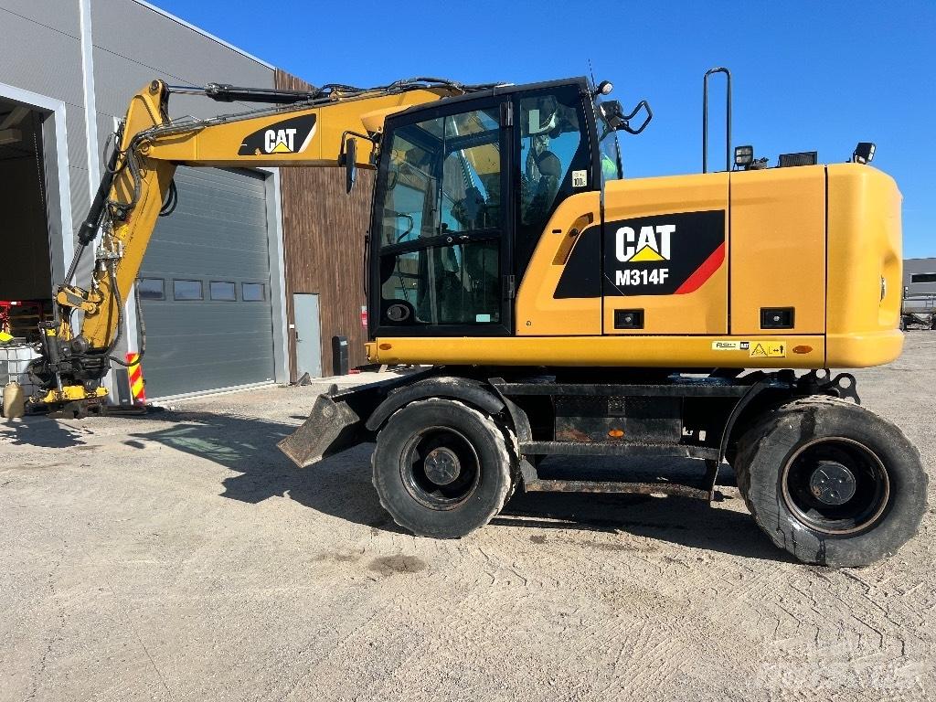 CAT M314F حفارات بعجل