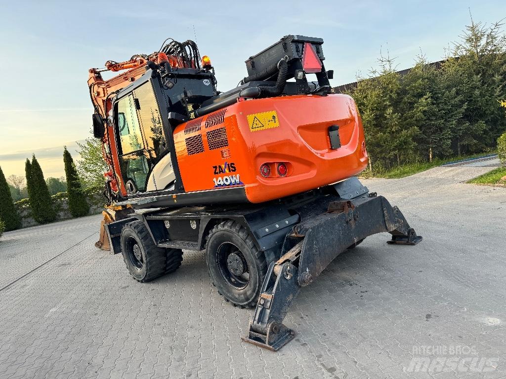 Hitachi ZX 140 W-6 حفارات بعجل