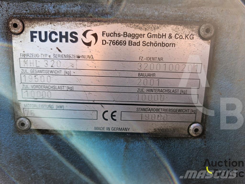 Fuchs MHL 320 حفارات بعجل