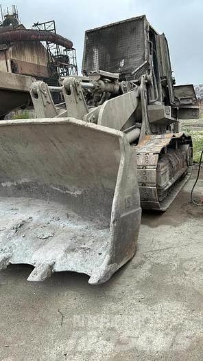 CAT 973D - لوادر بعجل