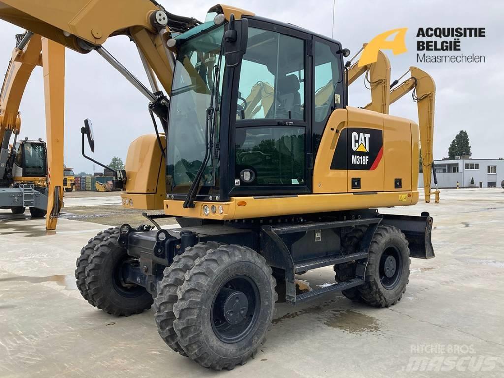 CAT M318F حفارات بعجل