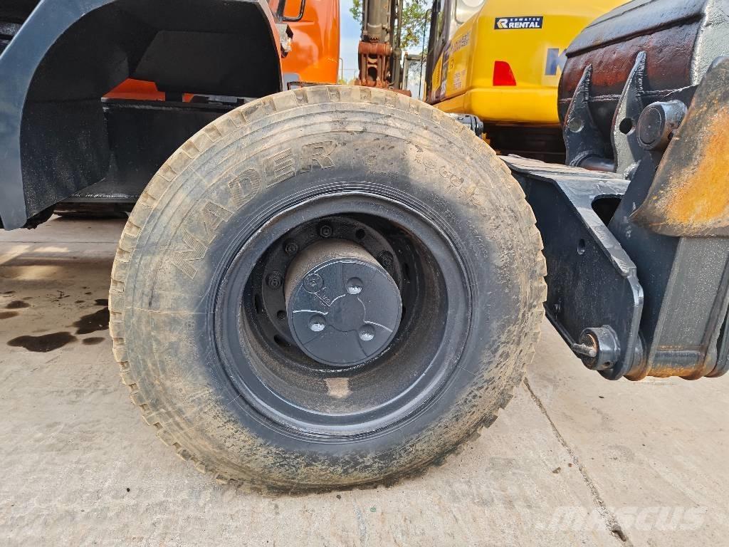 Hyundai R210W-9 حفارات بعجل