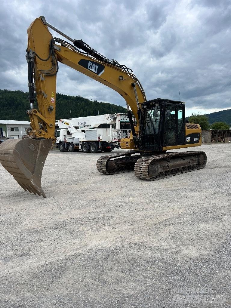 CAT 319 D L حفارات زحافة