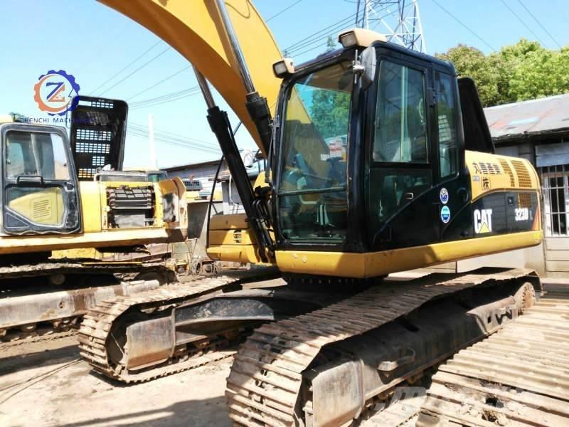 CAT 323 D L حفارات زحافة