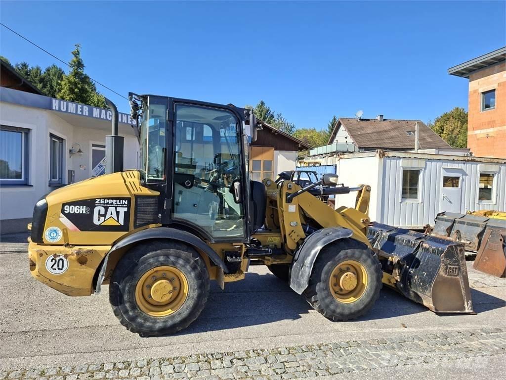 CAT 906H2 لوادر بعجل