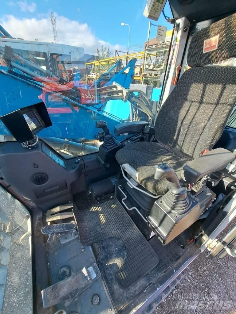 Fuchs MHL 320 مناولات المخلفات / مناولات صناعية
