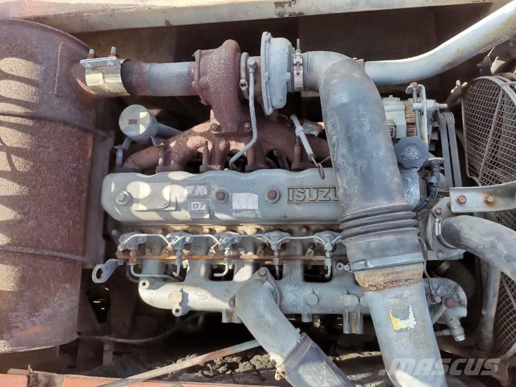 Hitachi ZX 210 W حفارات بعجل