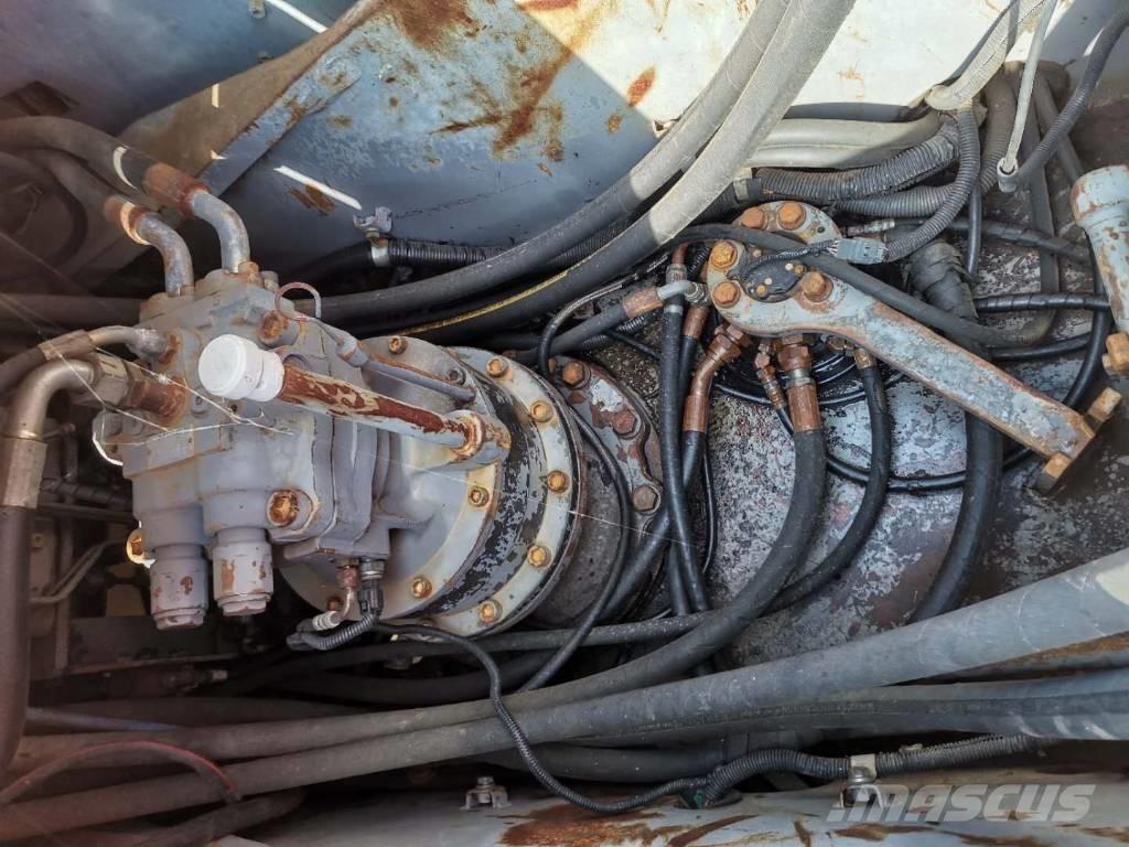 Hitachi ZX 210 W حفارات بعجل