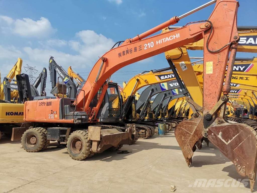 Hitachi ZX 210 W حفارات بعجل