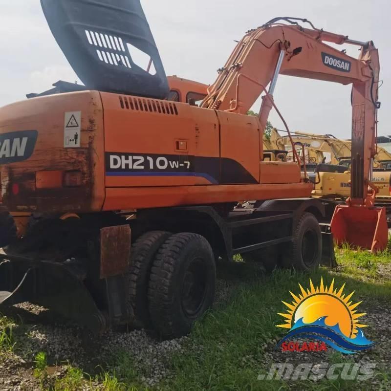 Doosan DH 210 W-7 حفارات بعجل