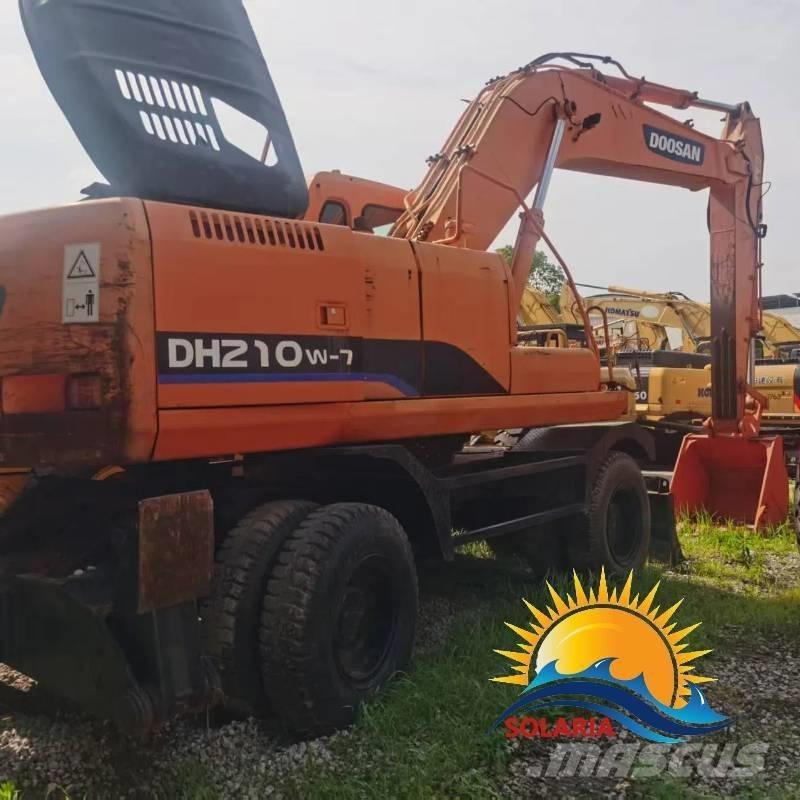 Doosan DH 210 W-7 حفارات بعجل