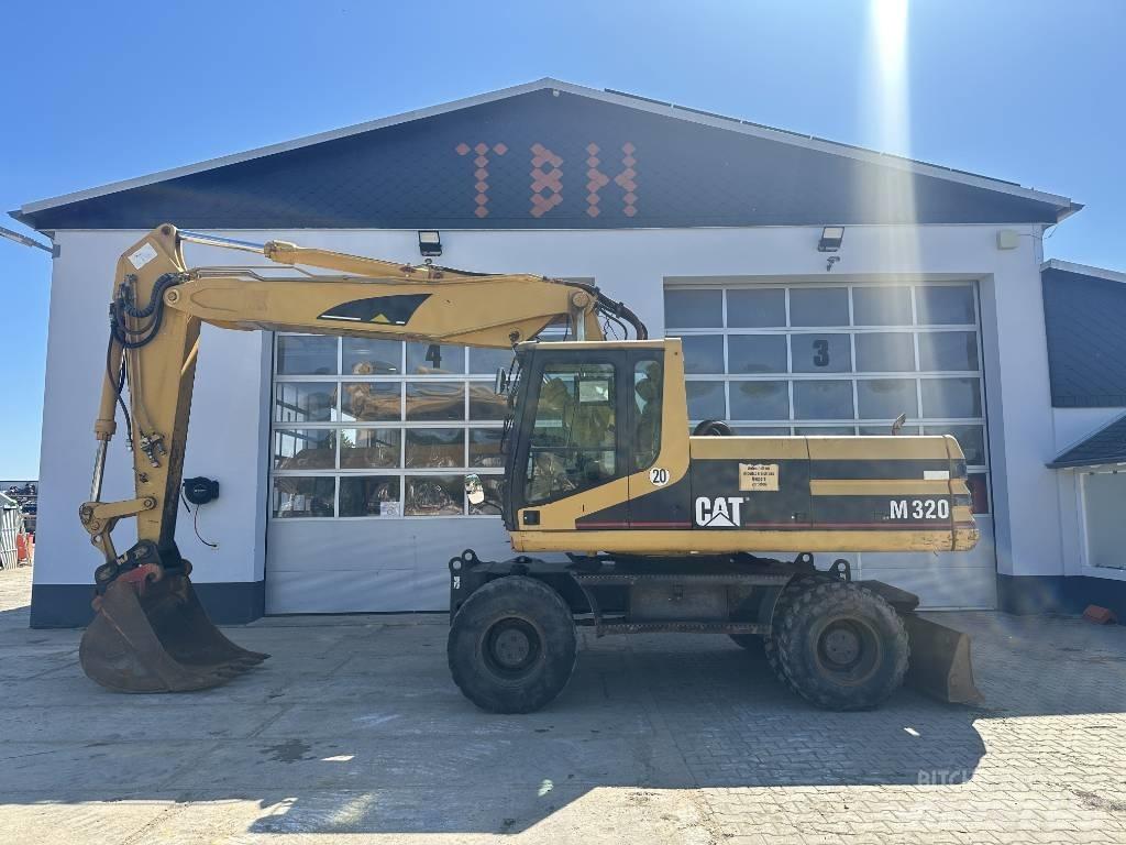 CAT M 320 VAH حفارات بعجل
