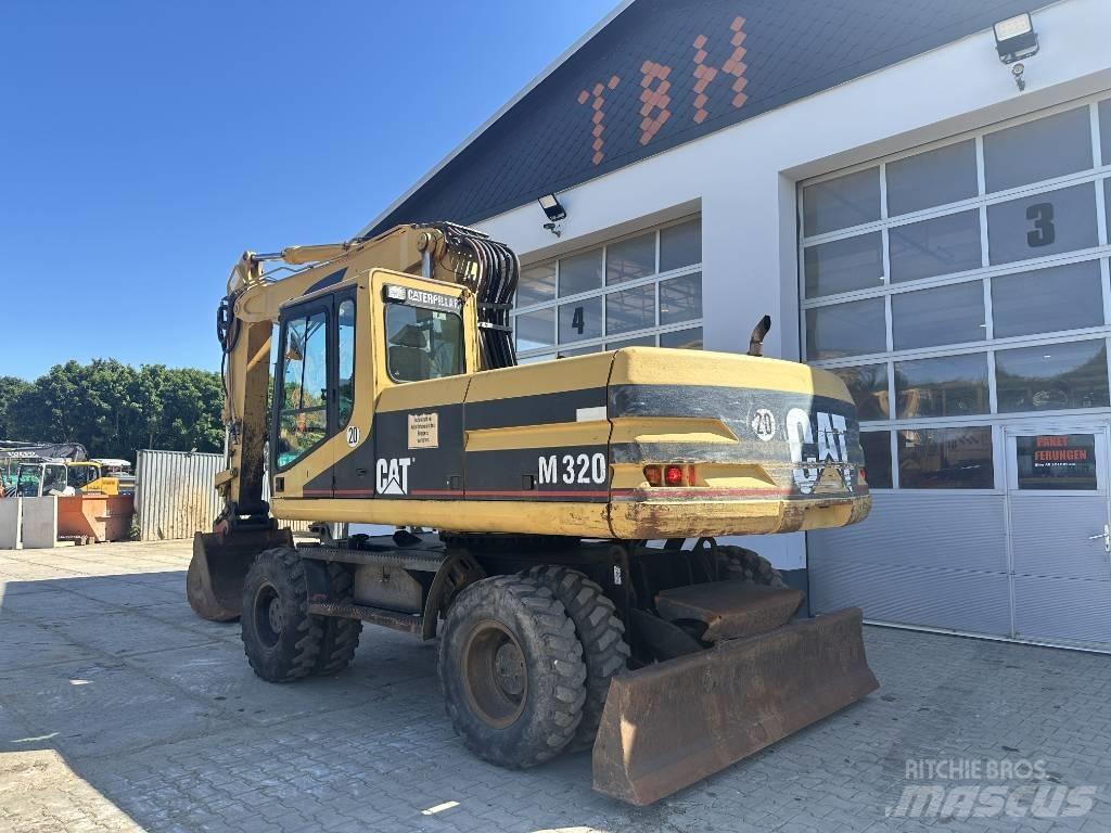 CAT M 320 VAH حفارات بعجل