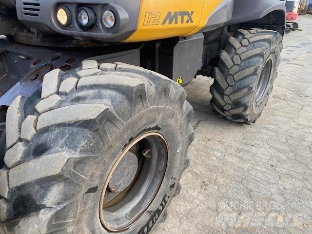 Mecalac 12 M TX حفارات بعجل