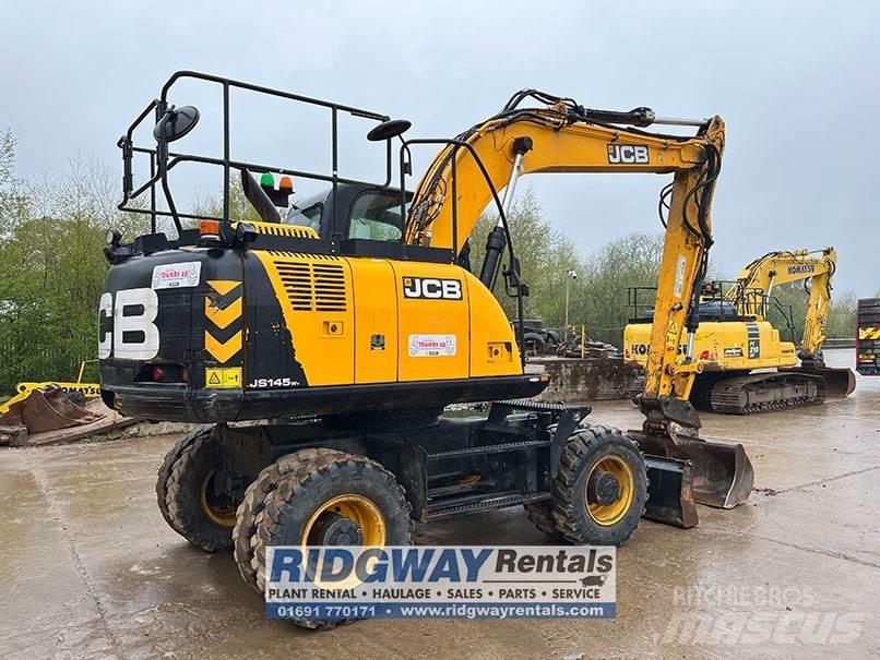JCB JS 145 W حفارات بعجل