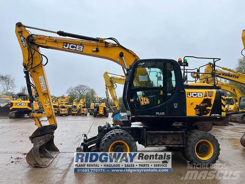 JCB JS 145 W حفارات بعجل