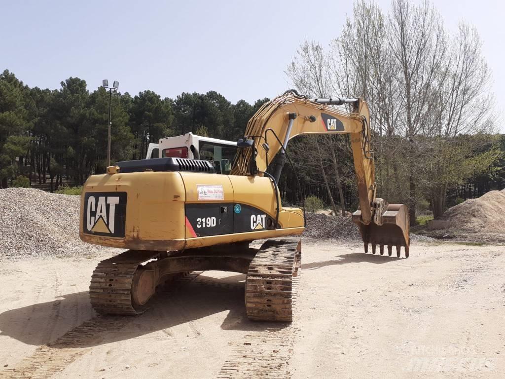 CAT 319 D L حفارات زحافة