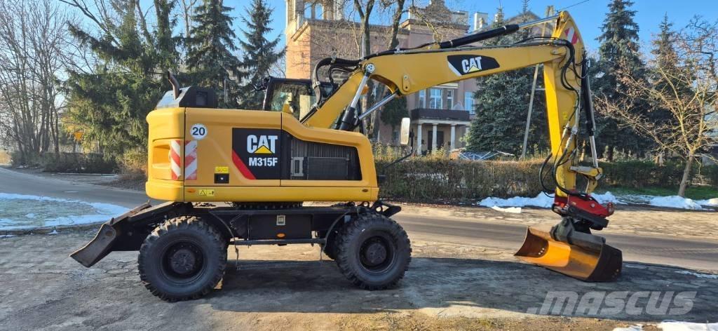 CAT M 315 F حفارات بعجل