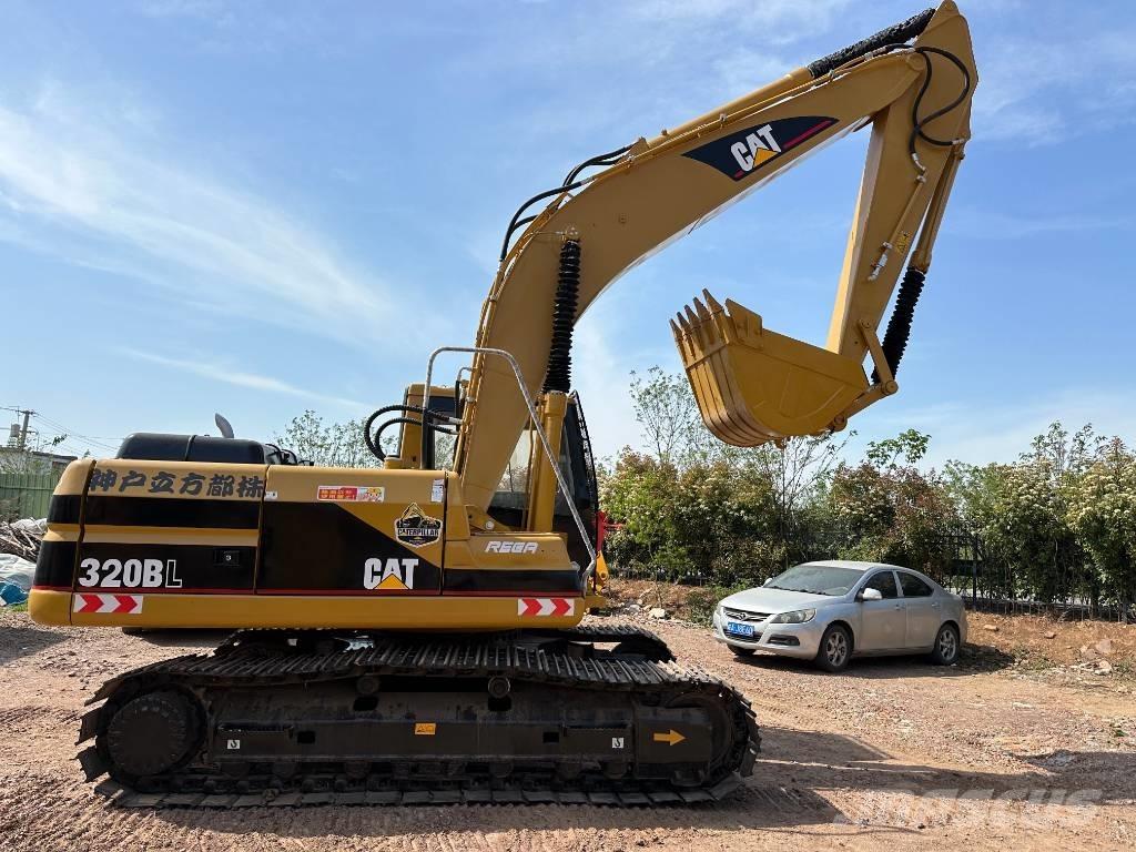 CAT 320 B L حفارات زحافة