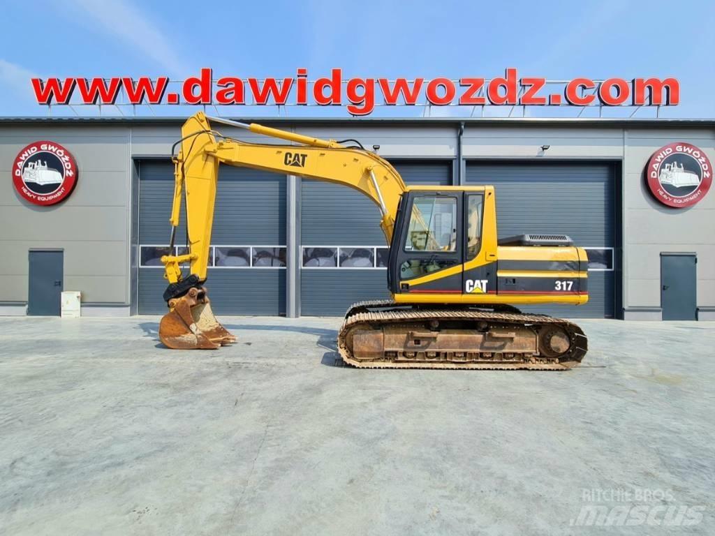 CAT 317 B L حفارات زحافة