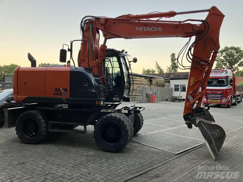 Hitachi ZX140-5B حفارات بعجل