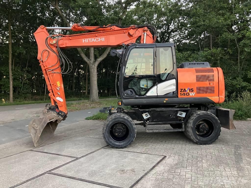 Hitachi ZX140-5B حفارات بعجل