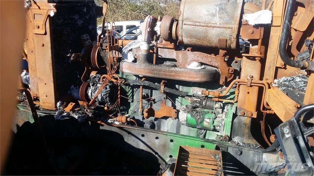 John Deere 7700 الجرارات