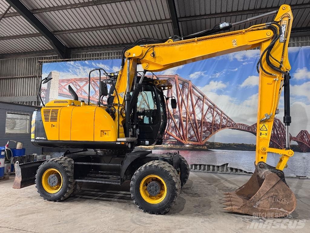 JCB JS 145 W حفارات بعجل