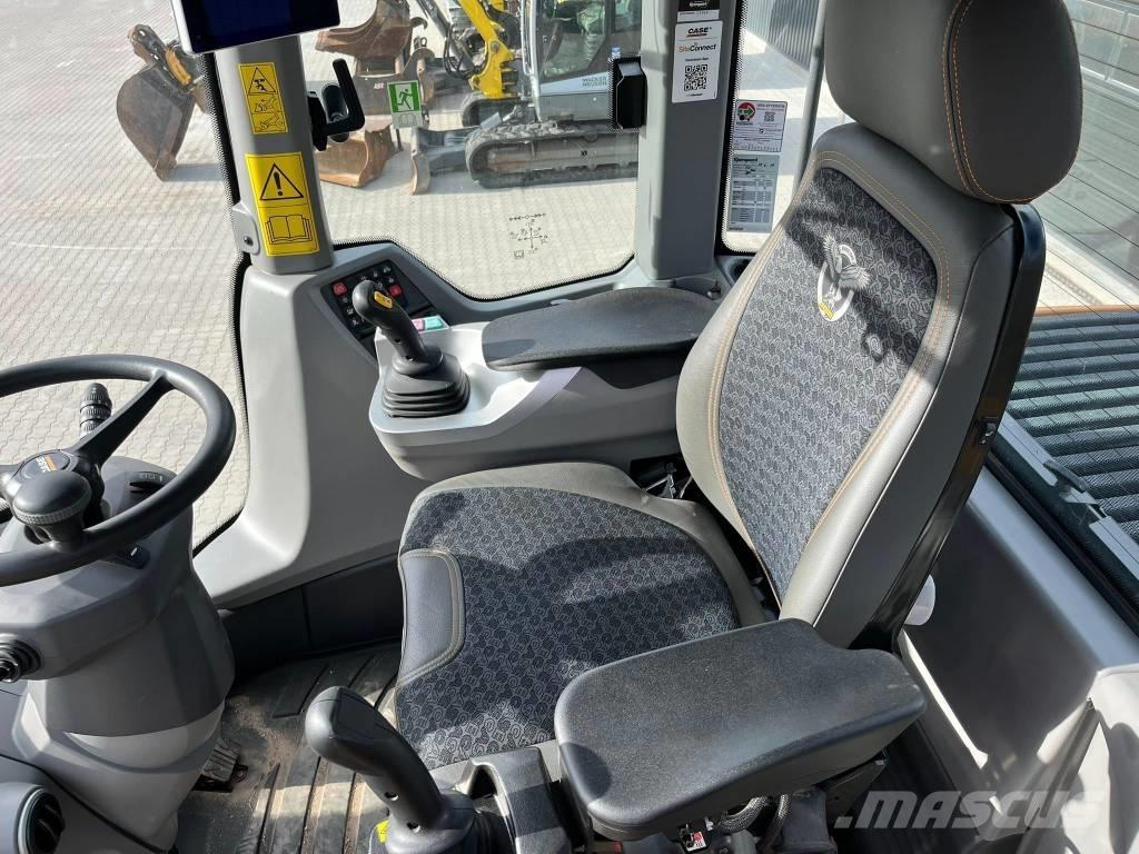 CASE 521 لوادر بعجل