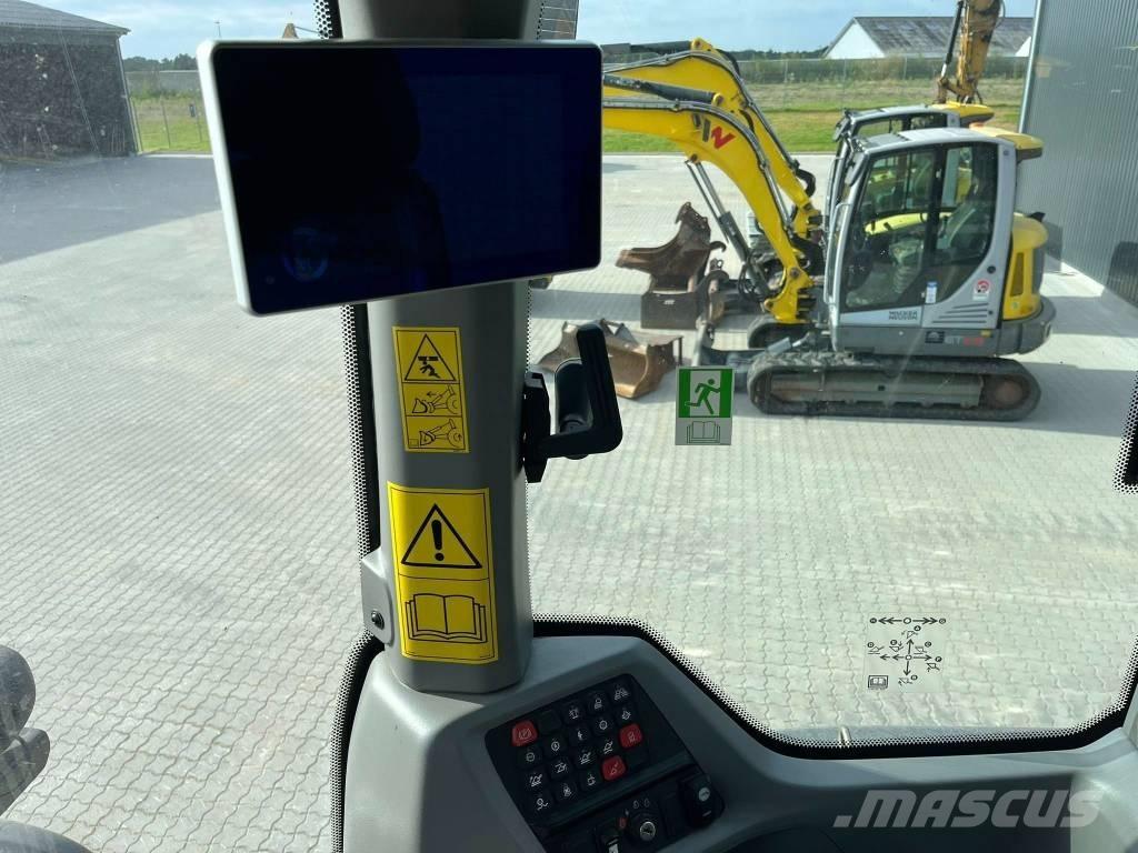 CASE 521 لوادر بعجل