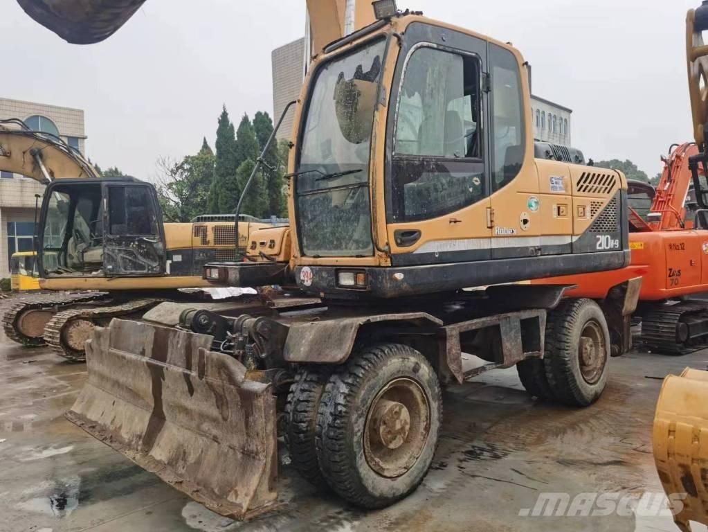 Hyundai R210W-9 حفارات بعجل