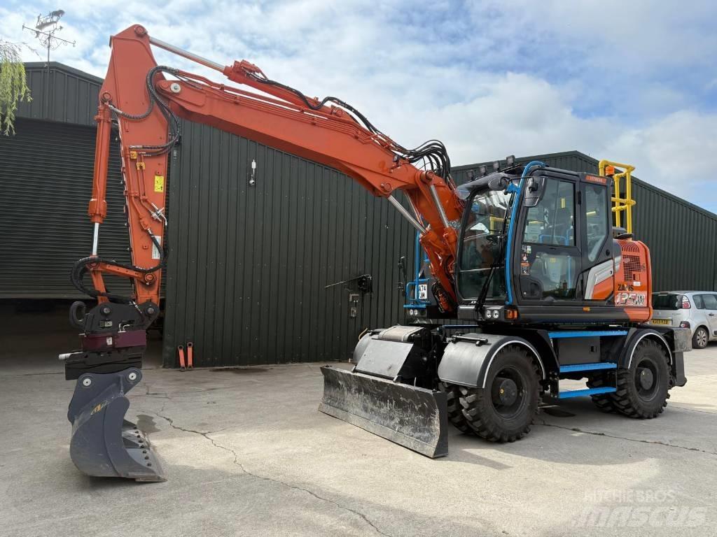 Hitachi ZX 135 W-7 حفارات بعجل