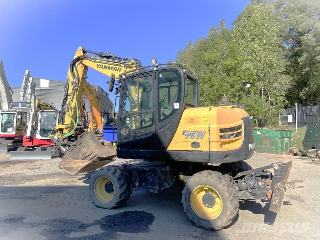 Yanmar B 95 W حفارات بعجل