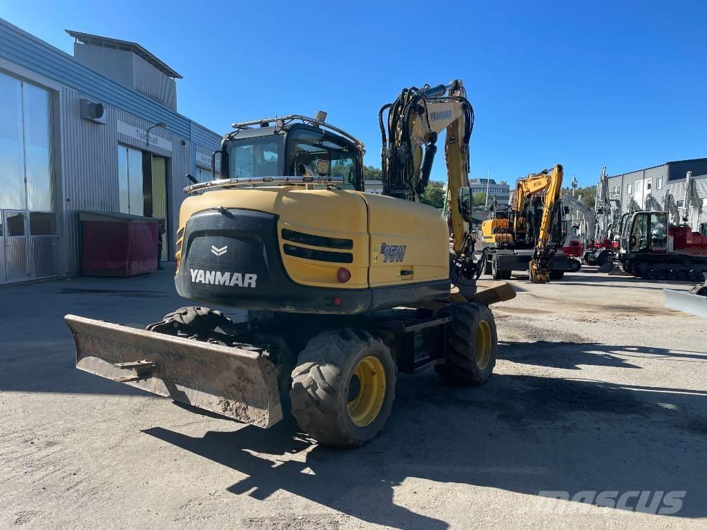 Yanmar B 95 W حفارات بعجل