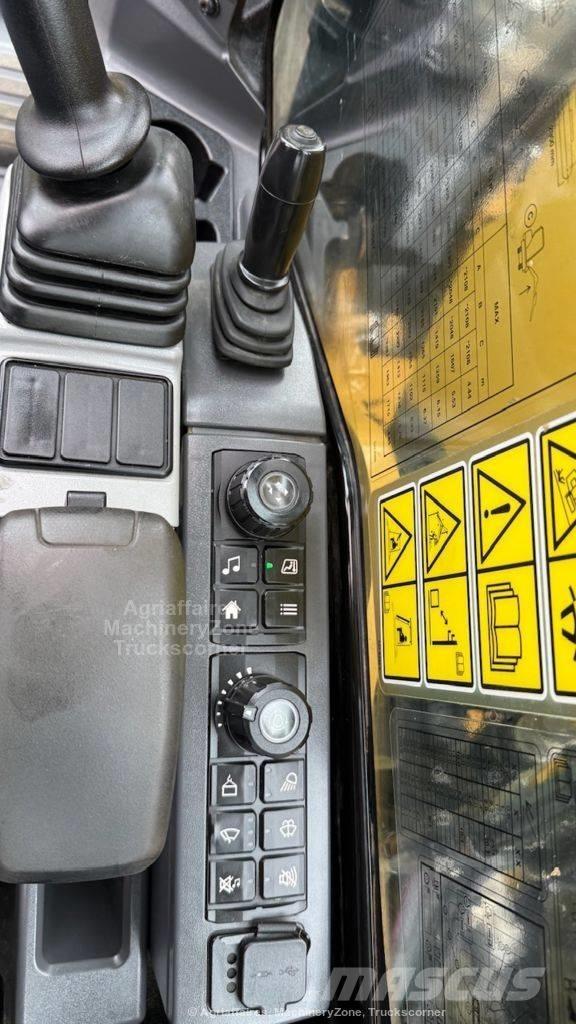 CAT 310 حفارات زحافة