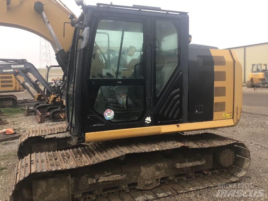 CAT 312 E L حفارات زحافة