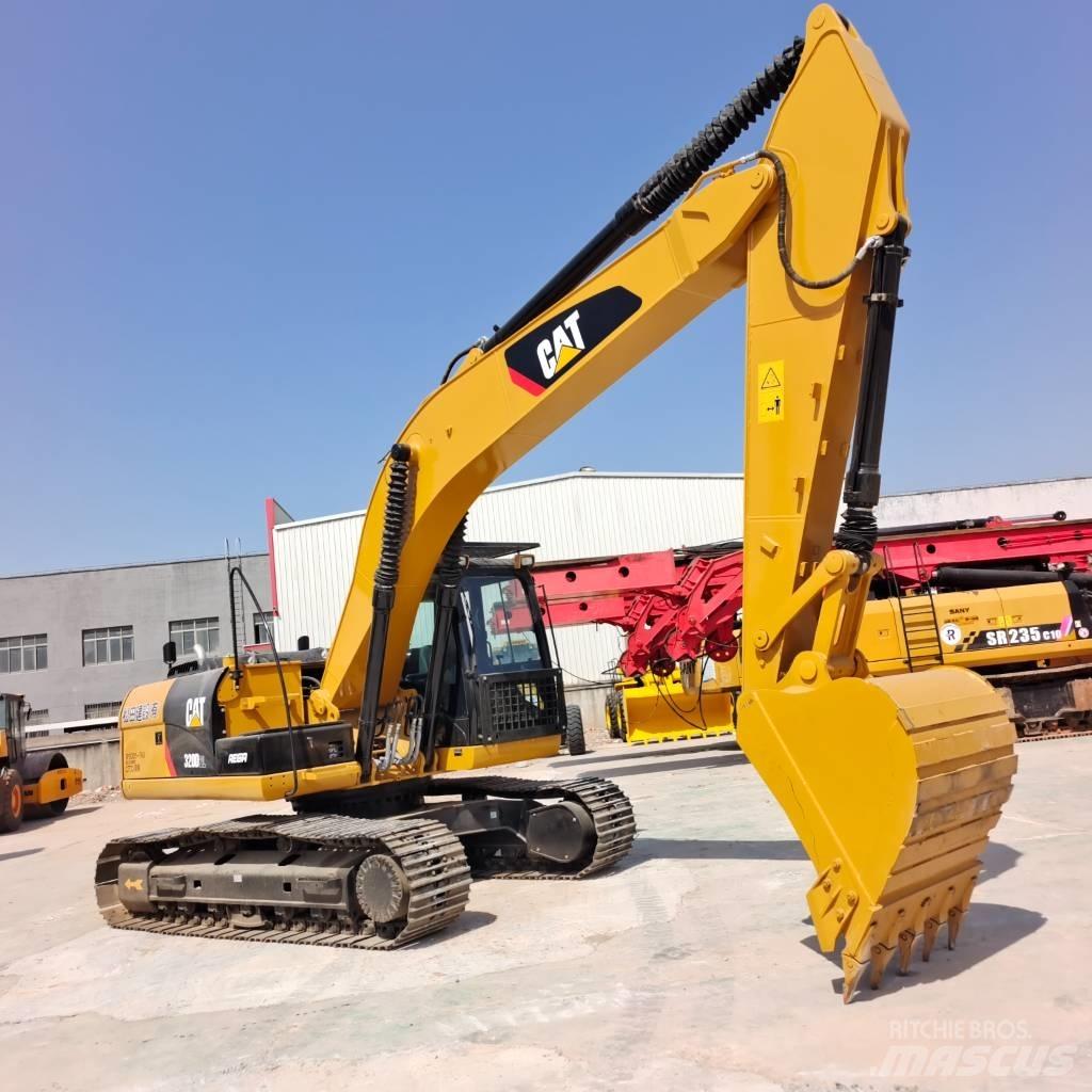 CAT 320 D L حفارات زحافة
