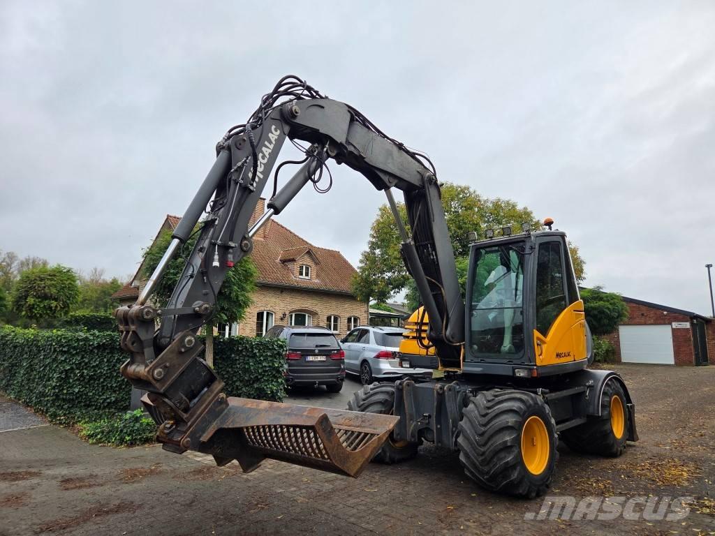Mecalac 714 MW حفارات بعجل