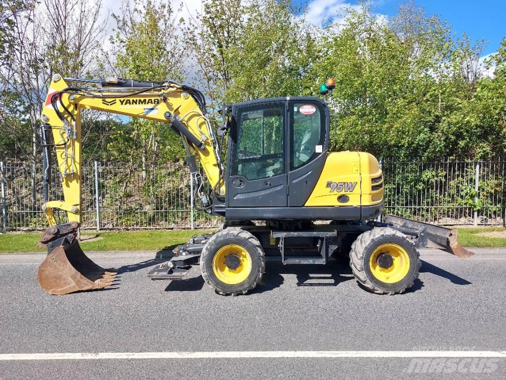 Yanmar B95W حفارات بعجل