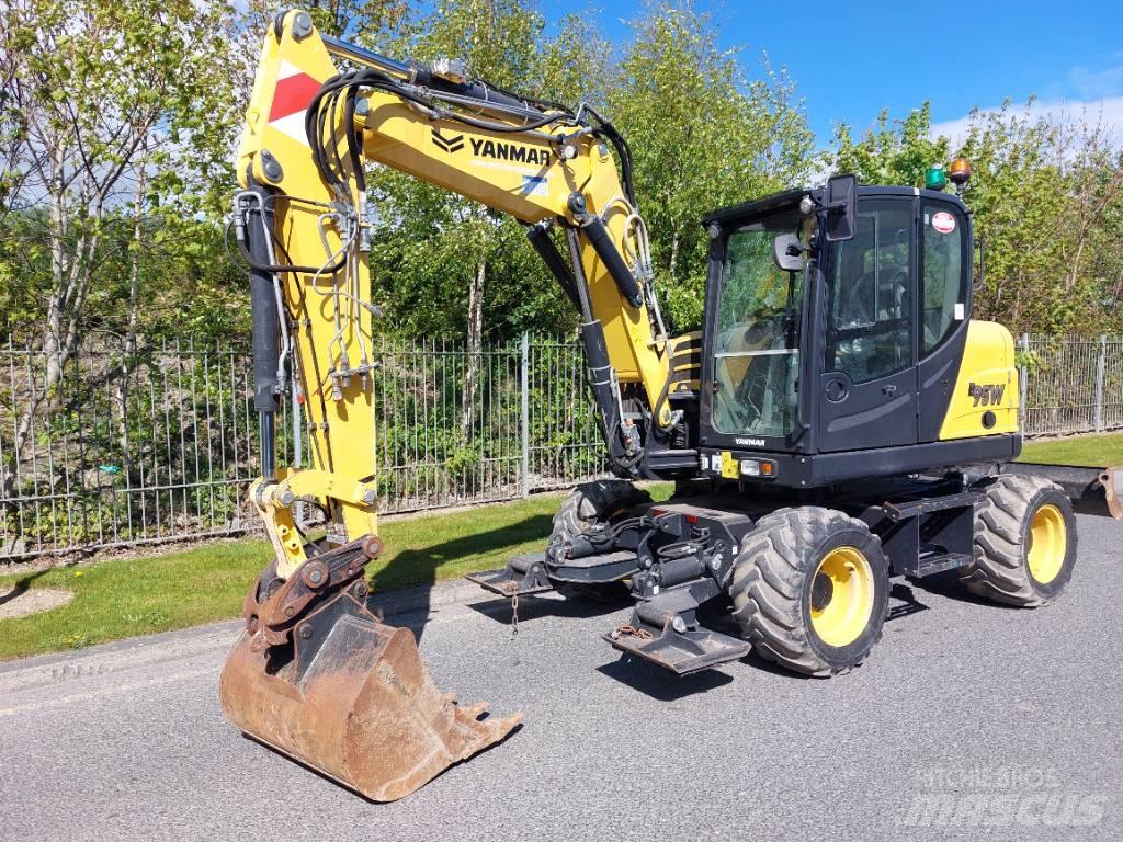 Yanmar B95W حفارات بعجل