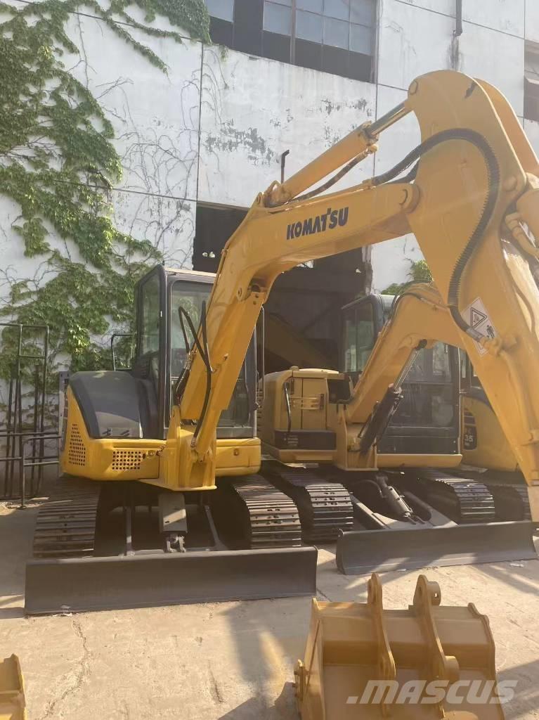 Komatsu PC 55 حفارات زحافة