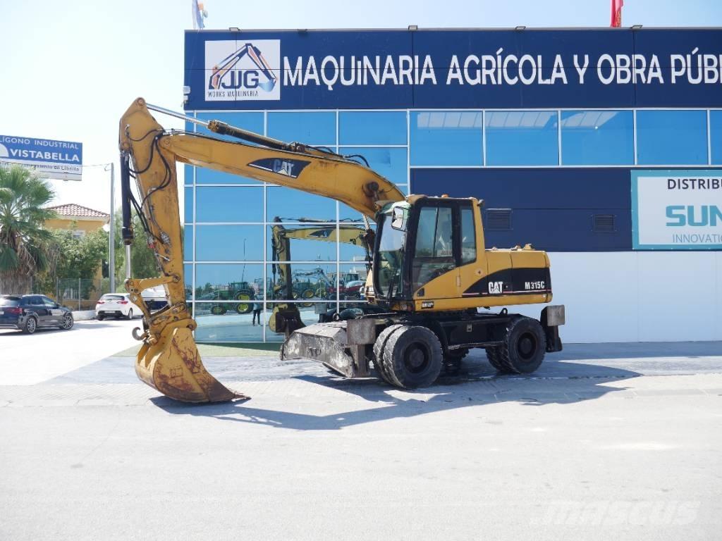 CAT M 315 C حفارات بعجل