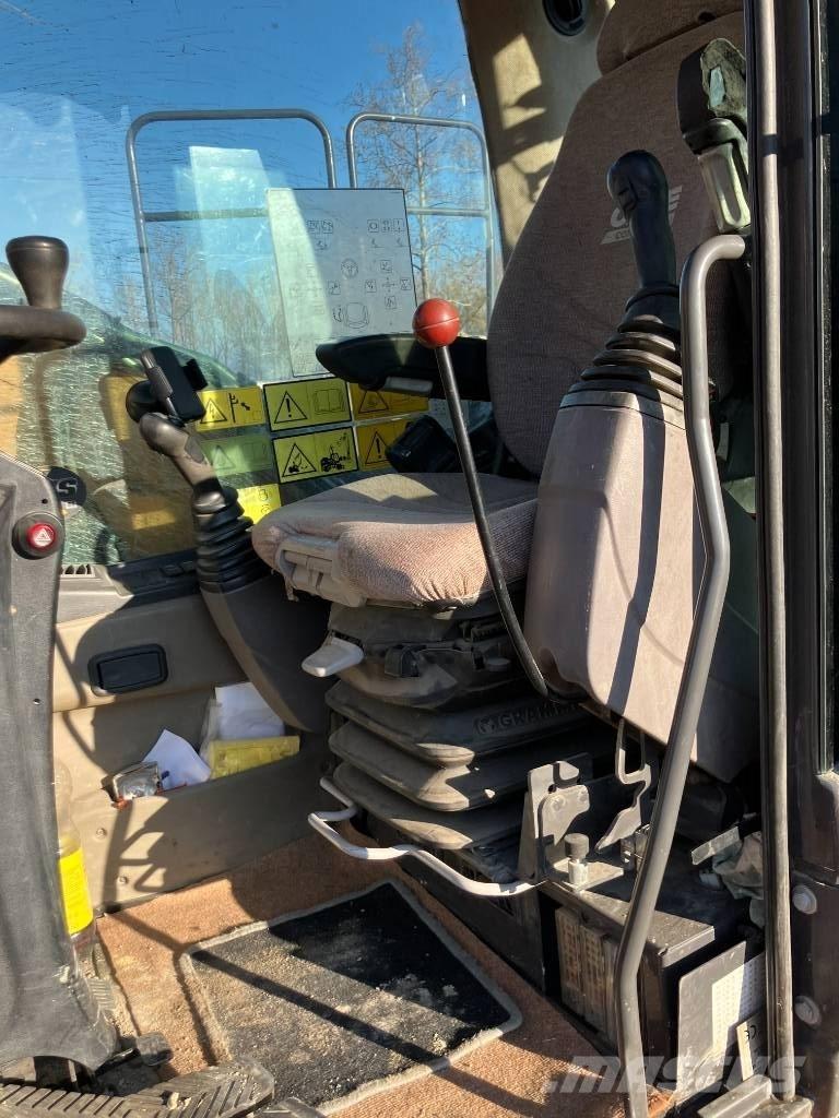 CASE WX 148 حفارات بعجل