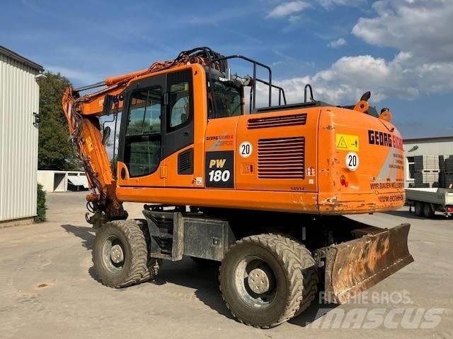 Komatsu PW 180-10 حفارات بعجل