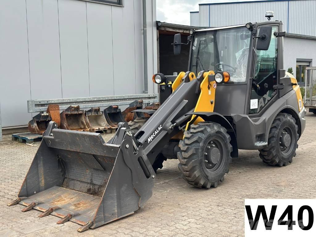 Mecalac AX 700 لوادر بعجل