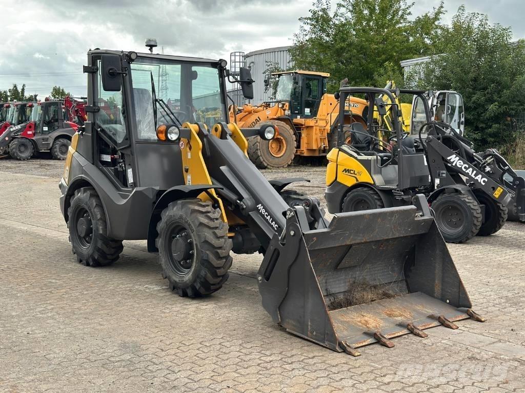 Mecalac AX 700 لوادر بعجل