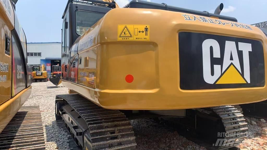 CAT 329 D L حفارات زحافة