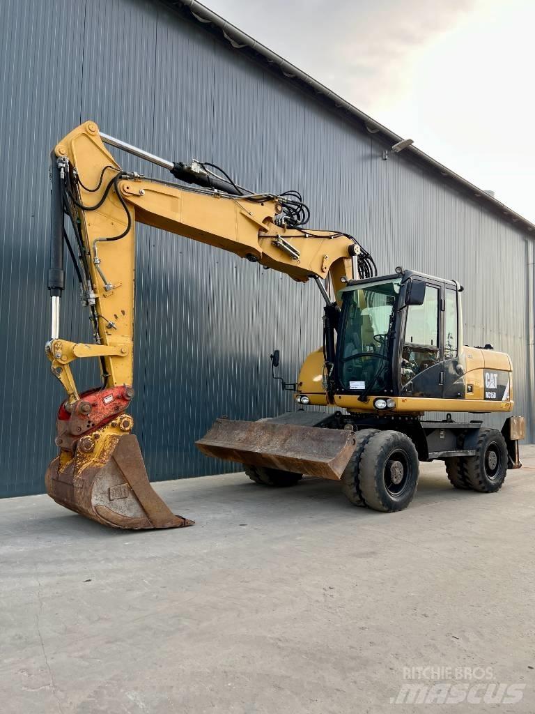 CAT M315D حفارات بعجل