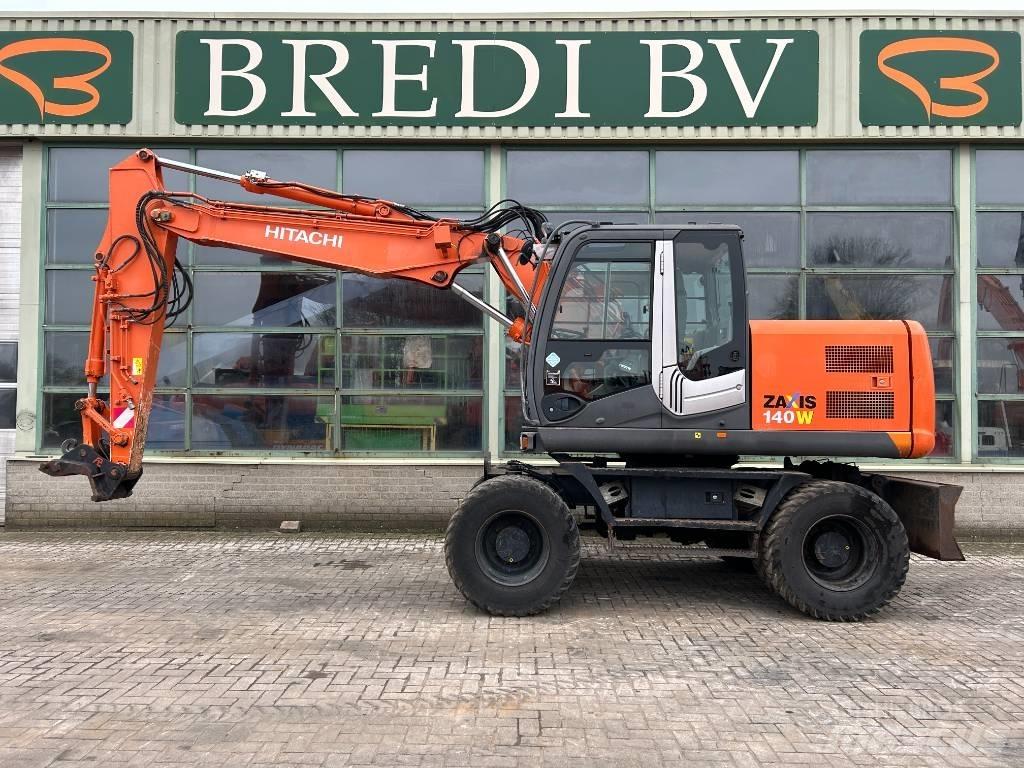 Hitachi ZX 140 W حفارات بعجل