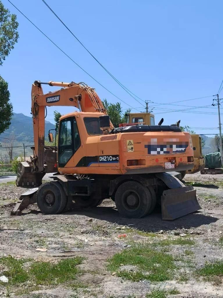Doosan DH210W-7 حفارات بعجل